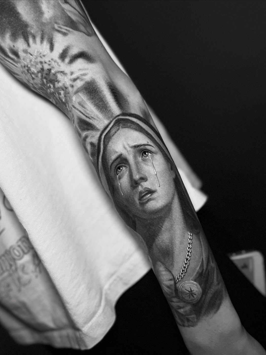 Tattoo by @kenndo.art — realism, black_and_grey