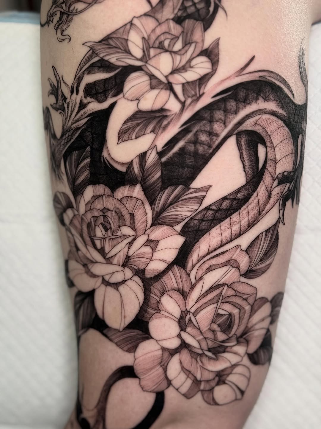 Tattoo by @whitehorsetattooing — black_and_grey, realism
