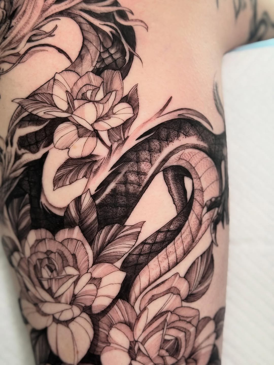 Tattoo by @whitehorsetattooing — black_and_grey, realism