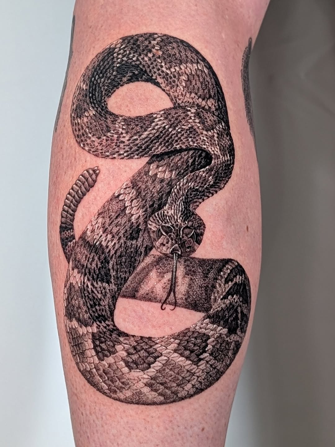 Tattoo by @arave.art โ realism, black_and_grey