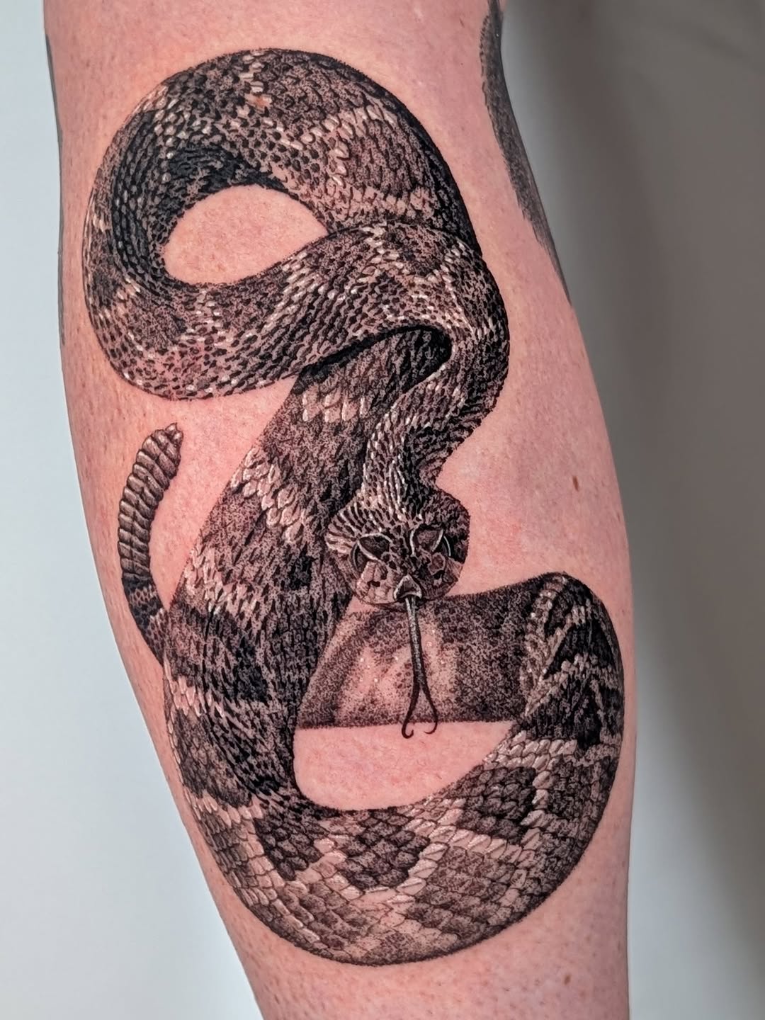 Tattoo by @arave.art โ realism, black_and_grey