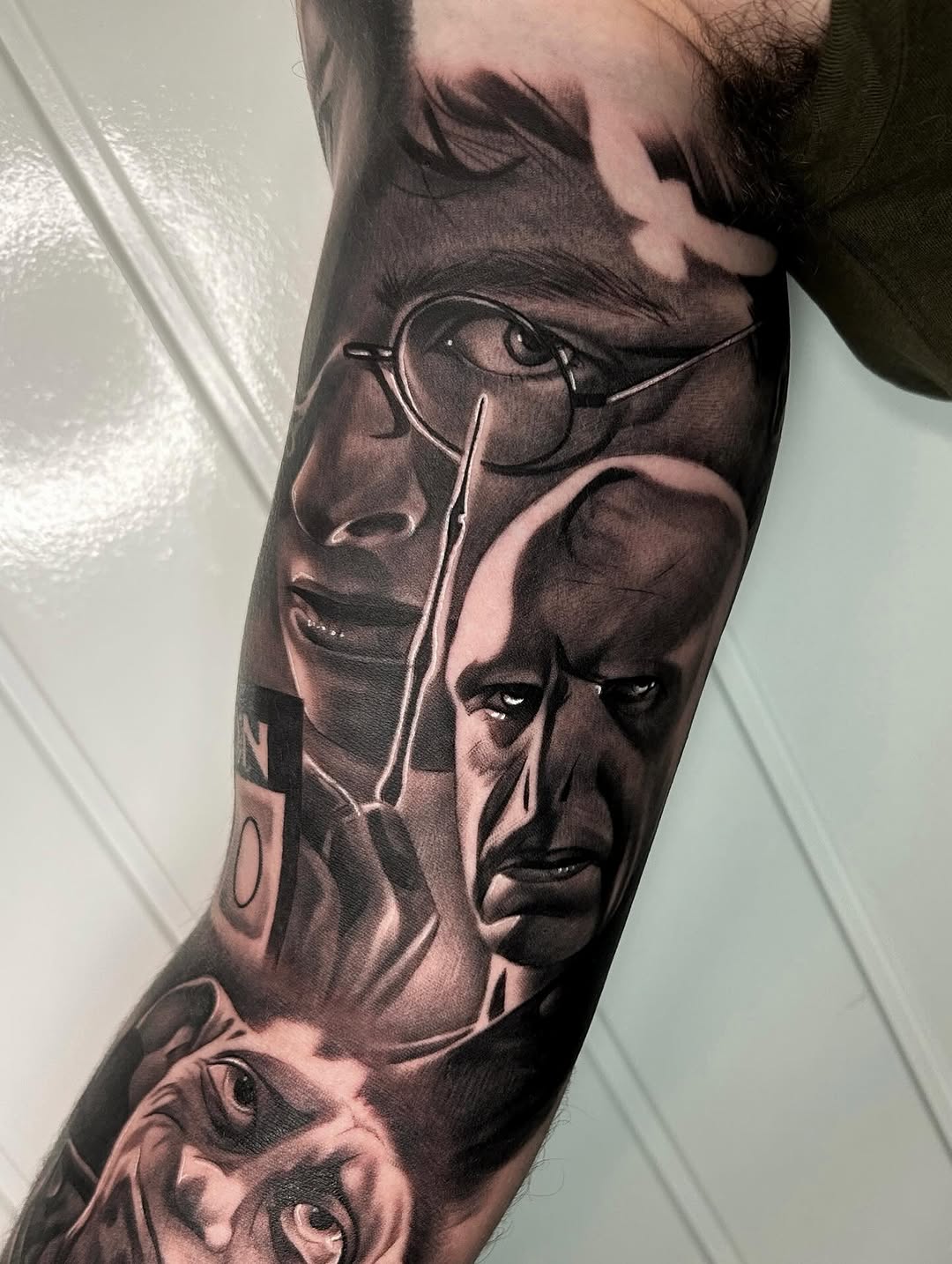 Tattoo by @harveyztattooz — realism, black_and_grey