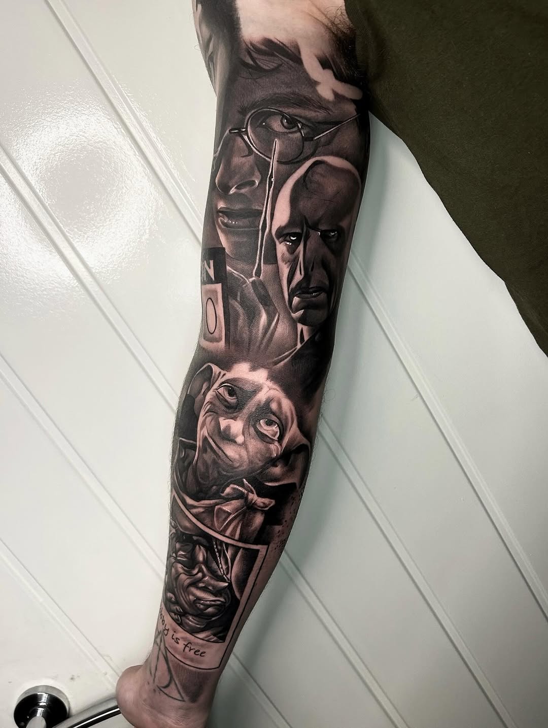 Tattoo by @harveyztattooz — realism, black_and_grey