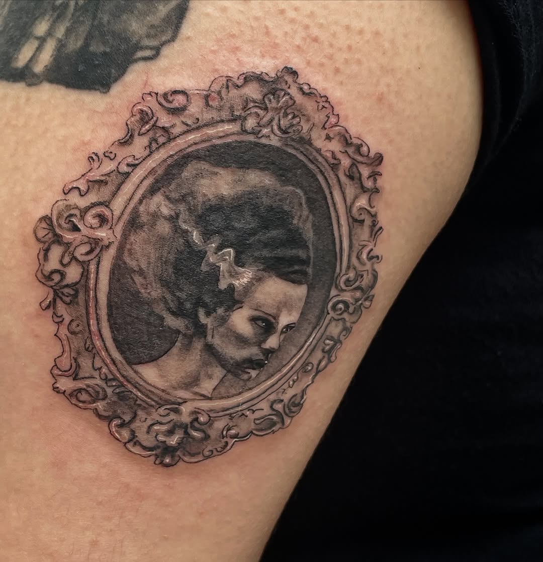 Tattoo by @m3ga.p1xlz — realism, black_and_grey