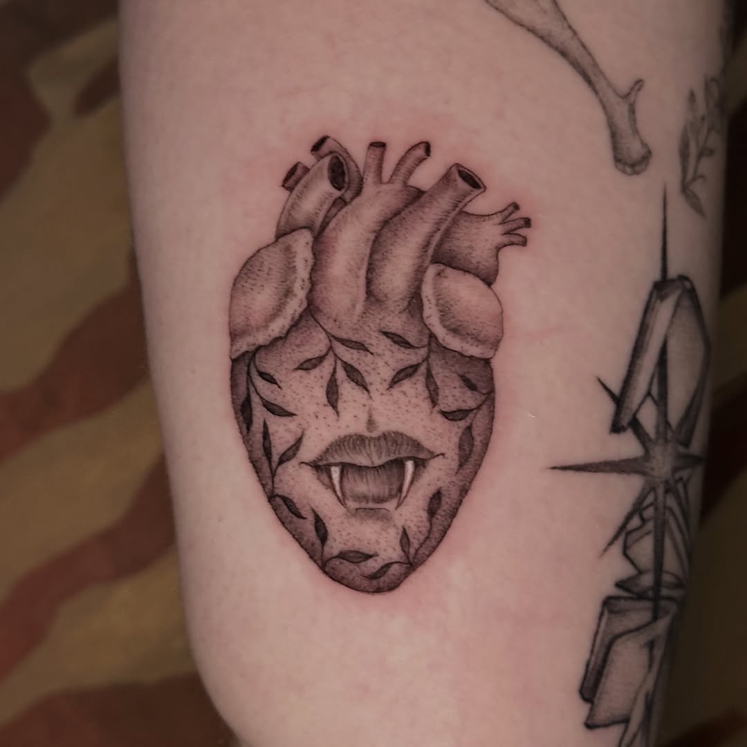 Tattoo by @carmensdarkgallery — black_and_grey, realism