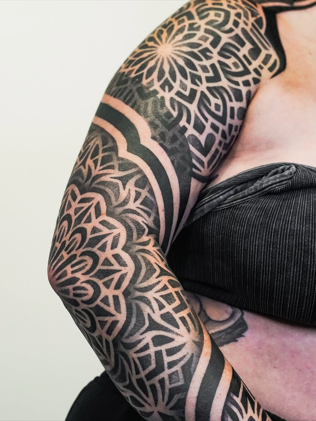 Tattoo by @rjxdots — geometric, blackwork