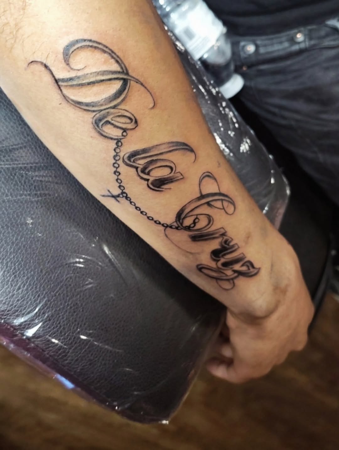 Tattoo by @inkw.ivy — lettering_script, chicano