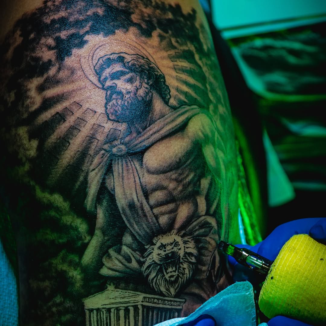 Tattoo by @sherifftattoos — realism, black_and_grey
