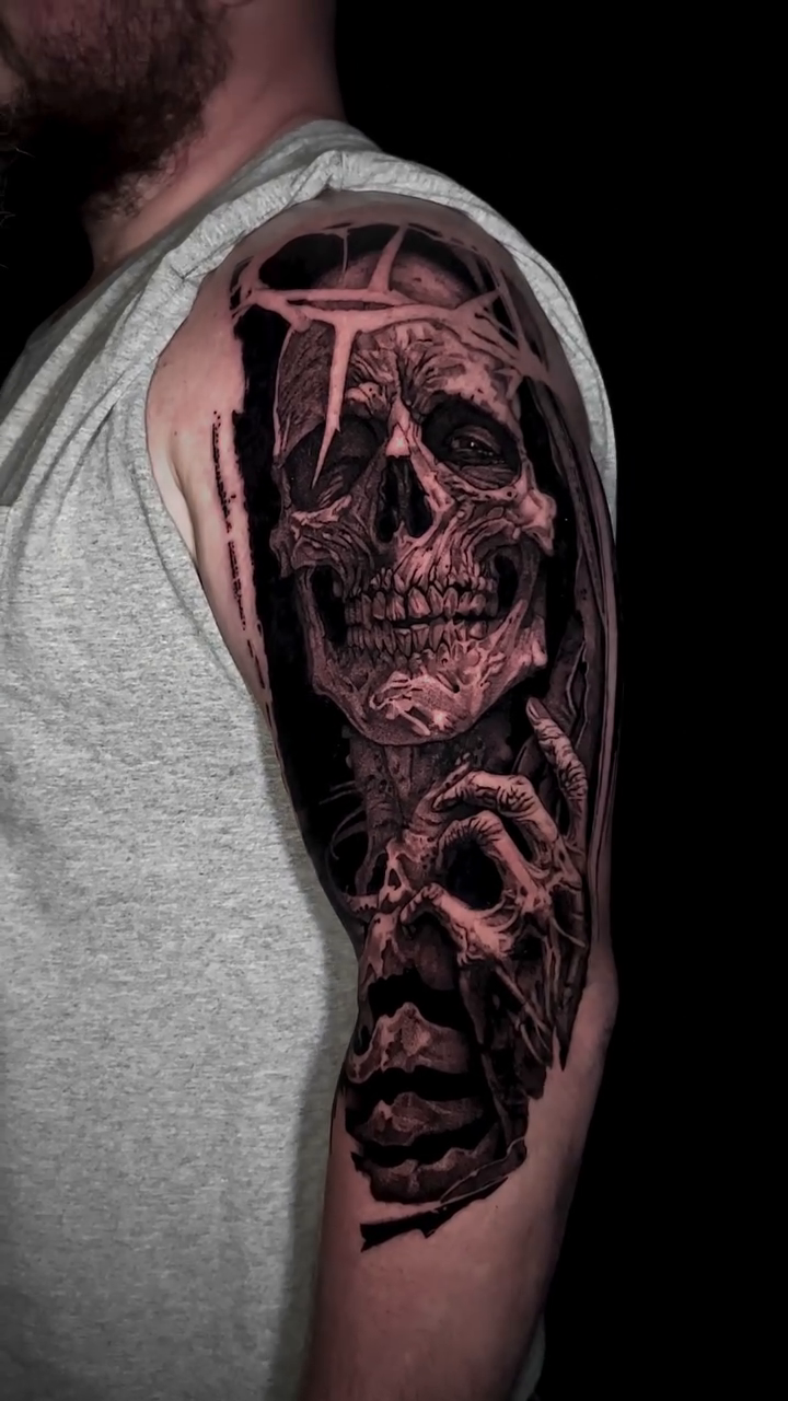 Tattoo by @laurav.tattoo — dark_realism, black_and_grey