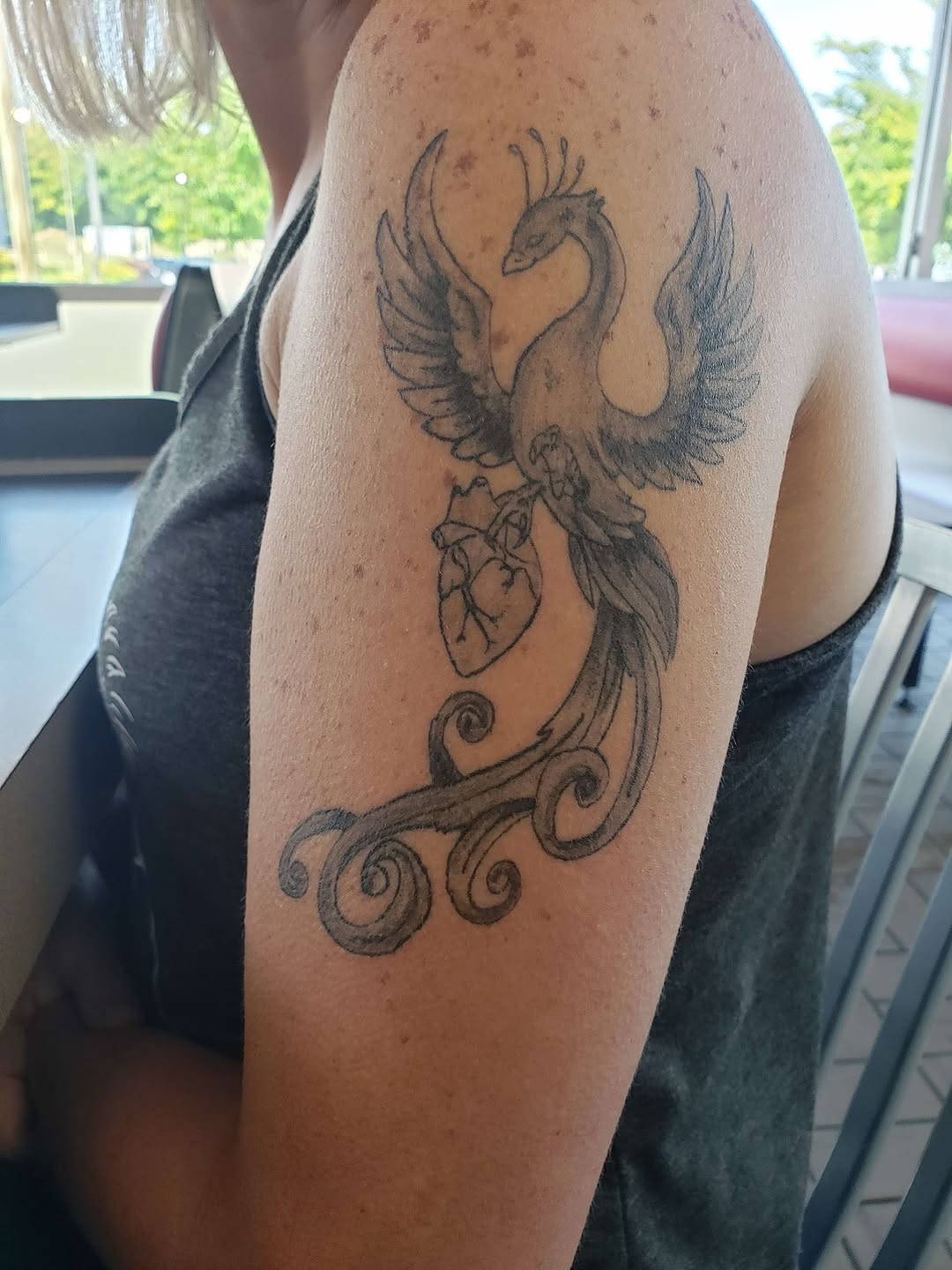 Tattoo by @wildroottattoo — illustrative, black_and_grey