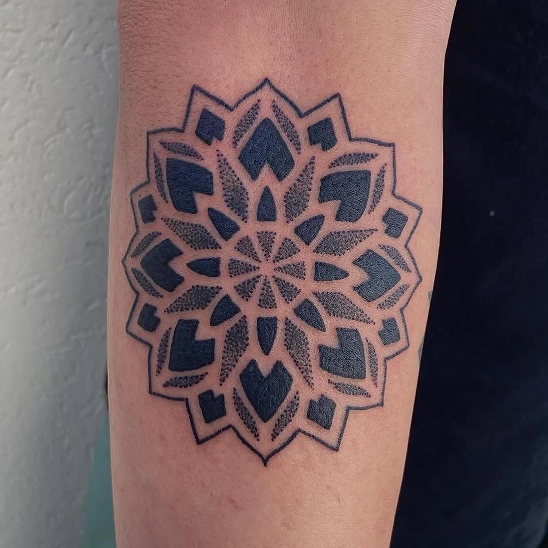 Tattoo by @vinnietatts — geometric, dotwork