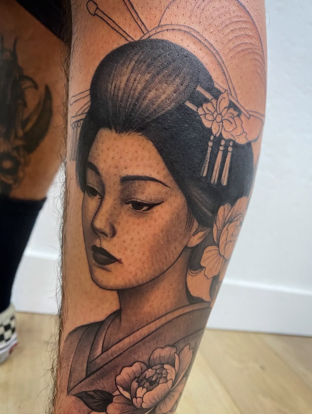 Tattoo by @cody.tatts — realism, black_and_grey