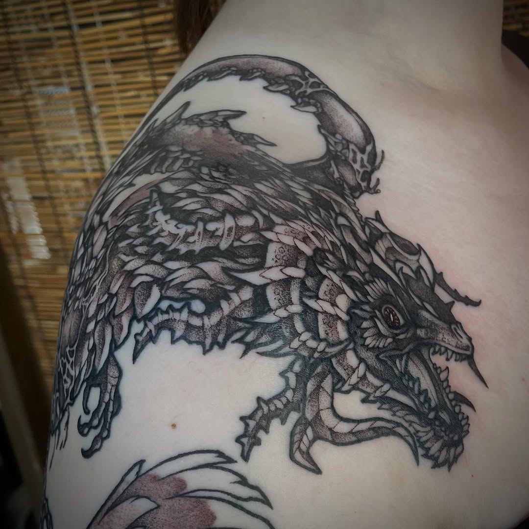 Tattoo by @darkwood.tattoos — black_and_grey, dotwork