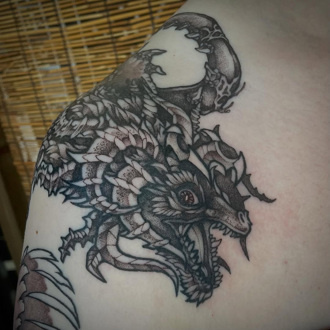 Tattoo by @darkwood.tattoos — black_and_grey, dotwork