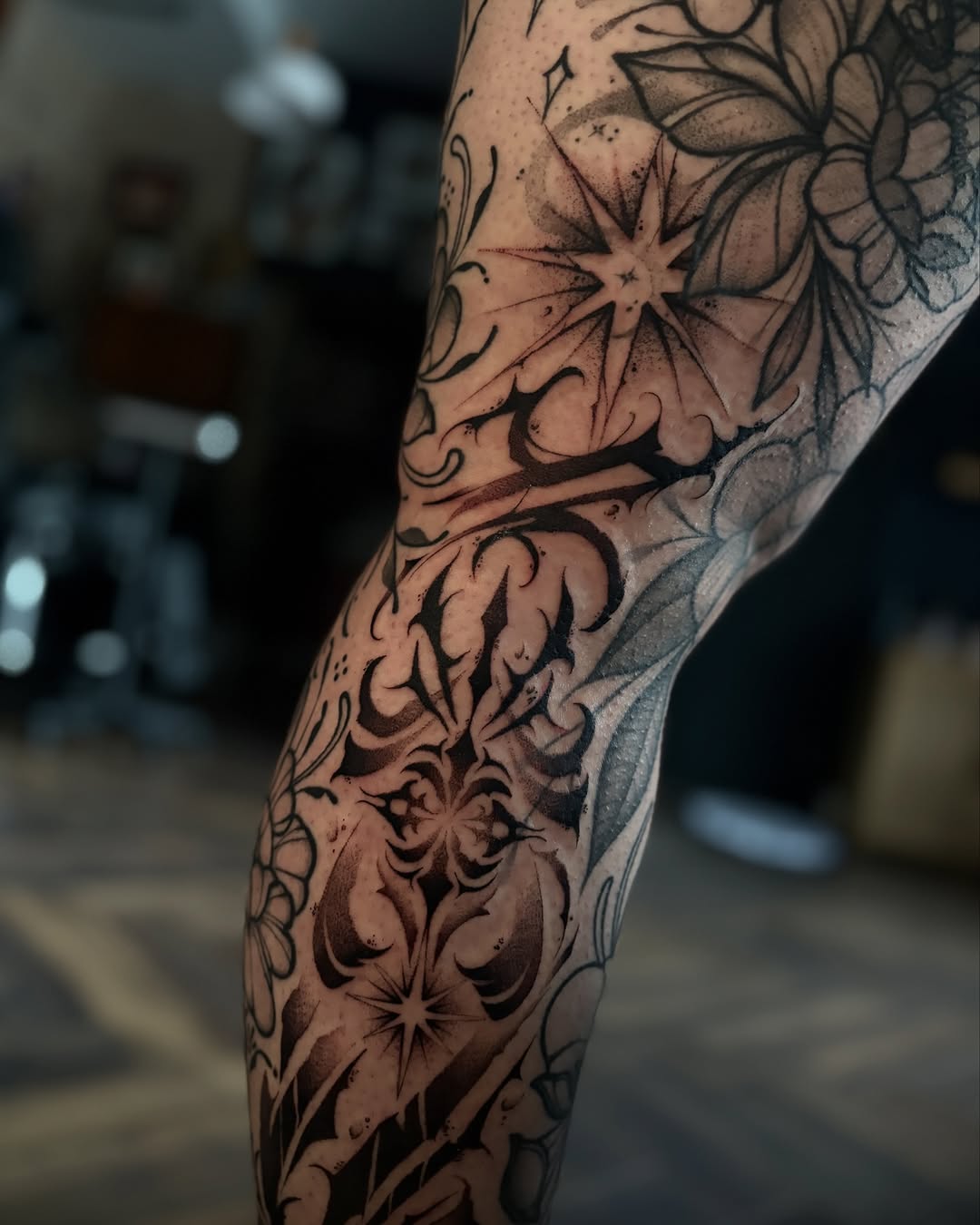 Tattoo by @strangegraves.ink — blackwork, illustrative