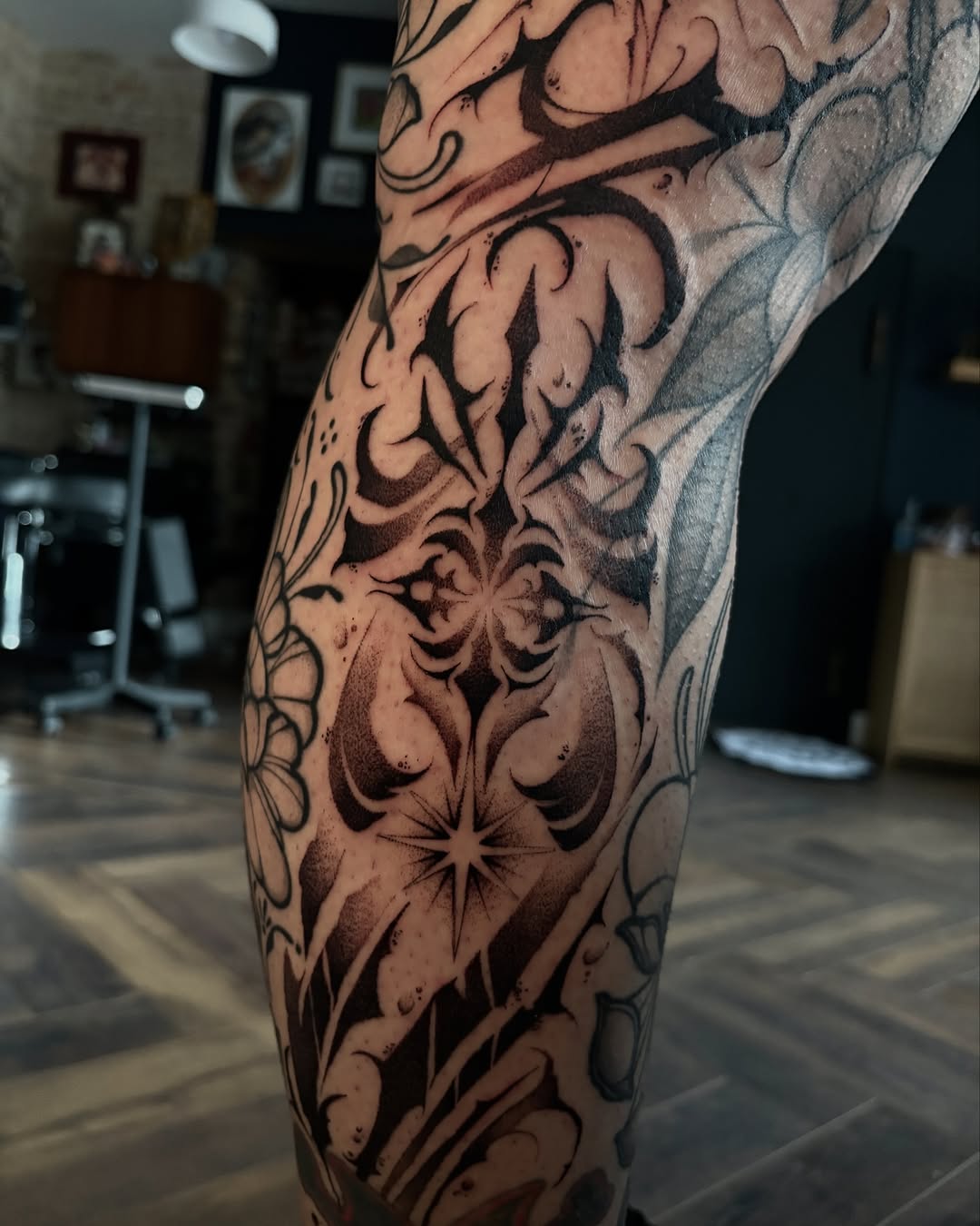 Tattoo by @strangegraves.ink — blackwork, ornamental