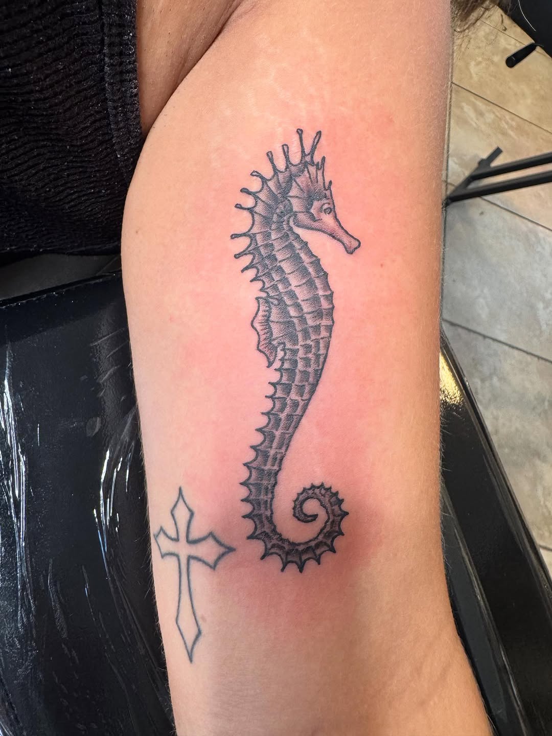 Tattoo by @bodymods_by_b — black_and_grey, realism