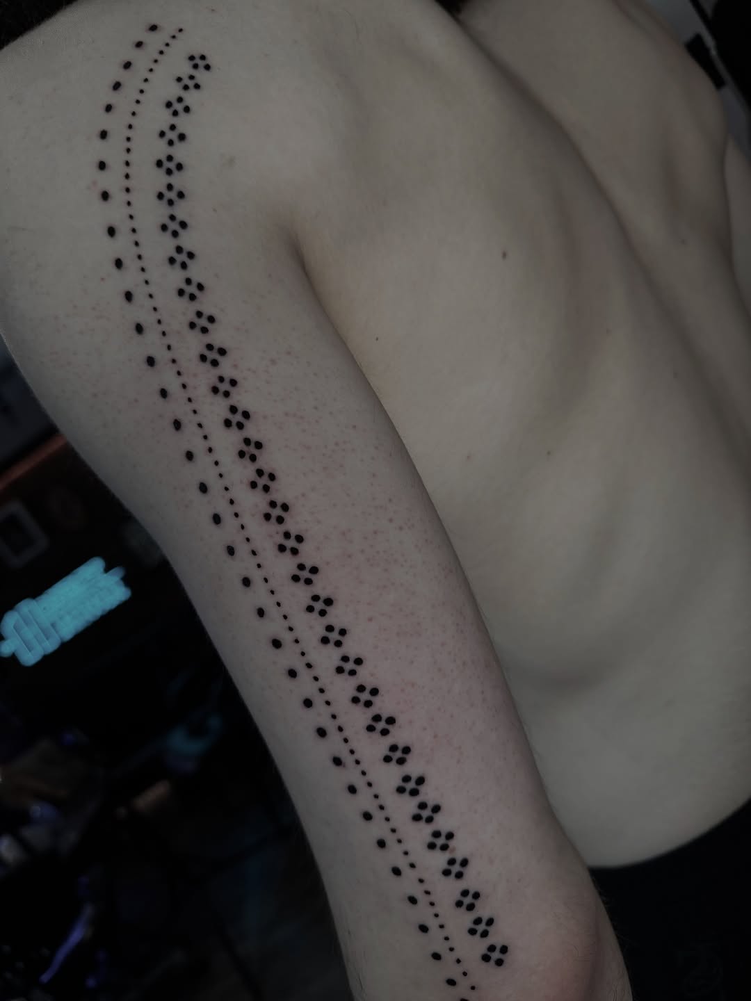 Tattoo by @chozentattoo — dotwork, geometric