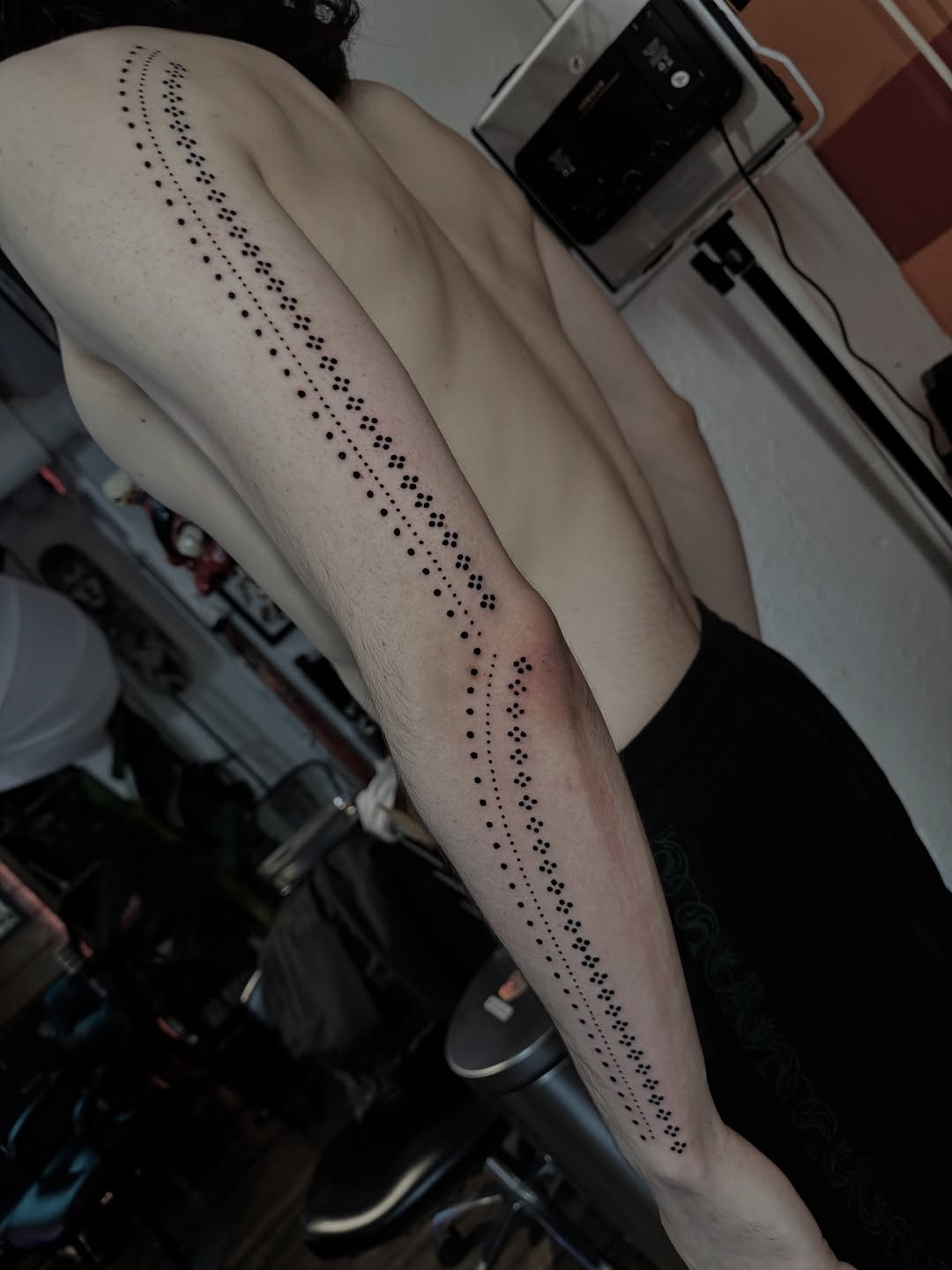 Tattoo by @chozentattoo — dotwork, geometric