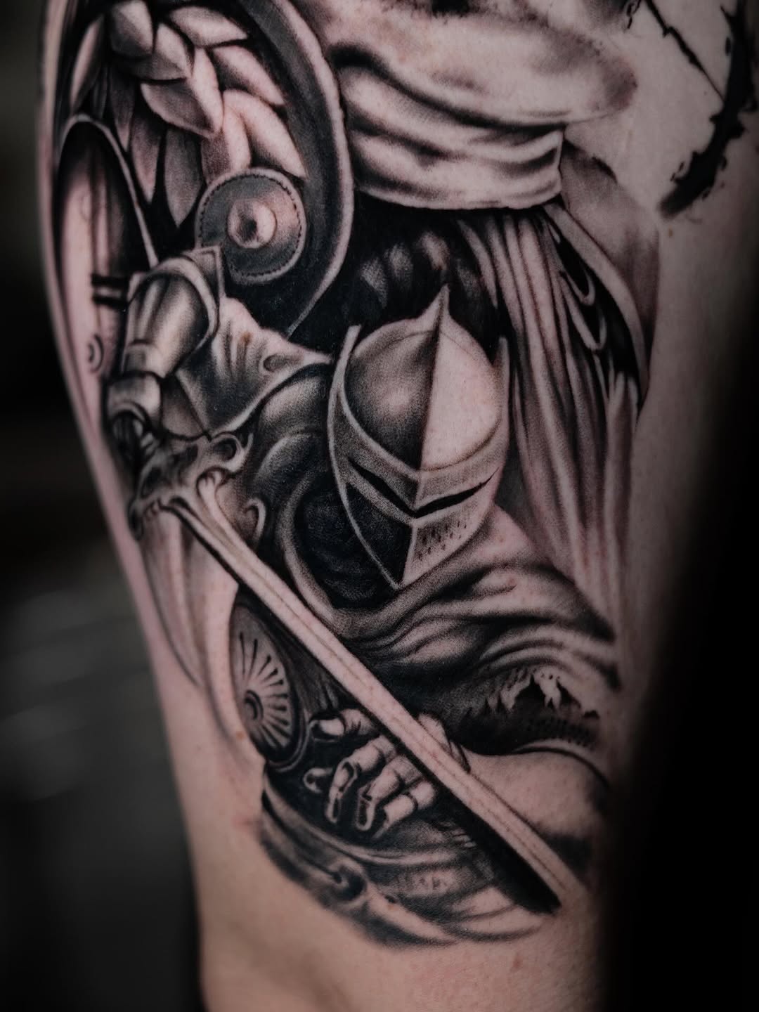 Tattoo by @tattoo_dzhyhov — black_and_grey, realism