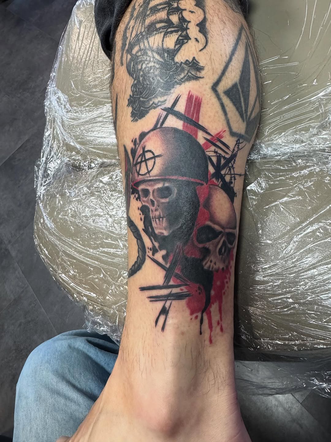 Tattoo by @bodymods_by_b — black_and_grey, trash_polka