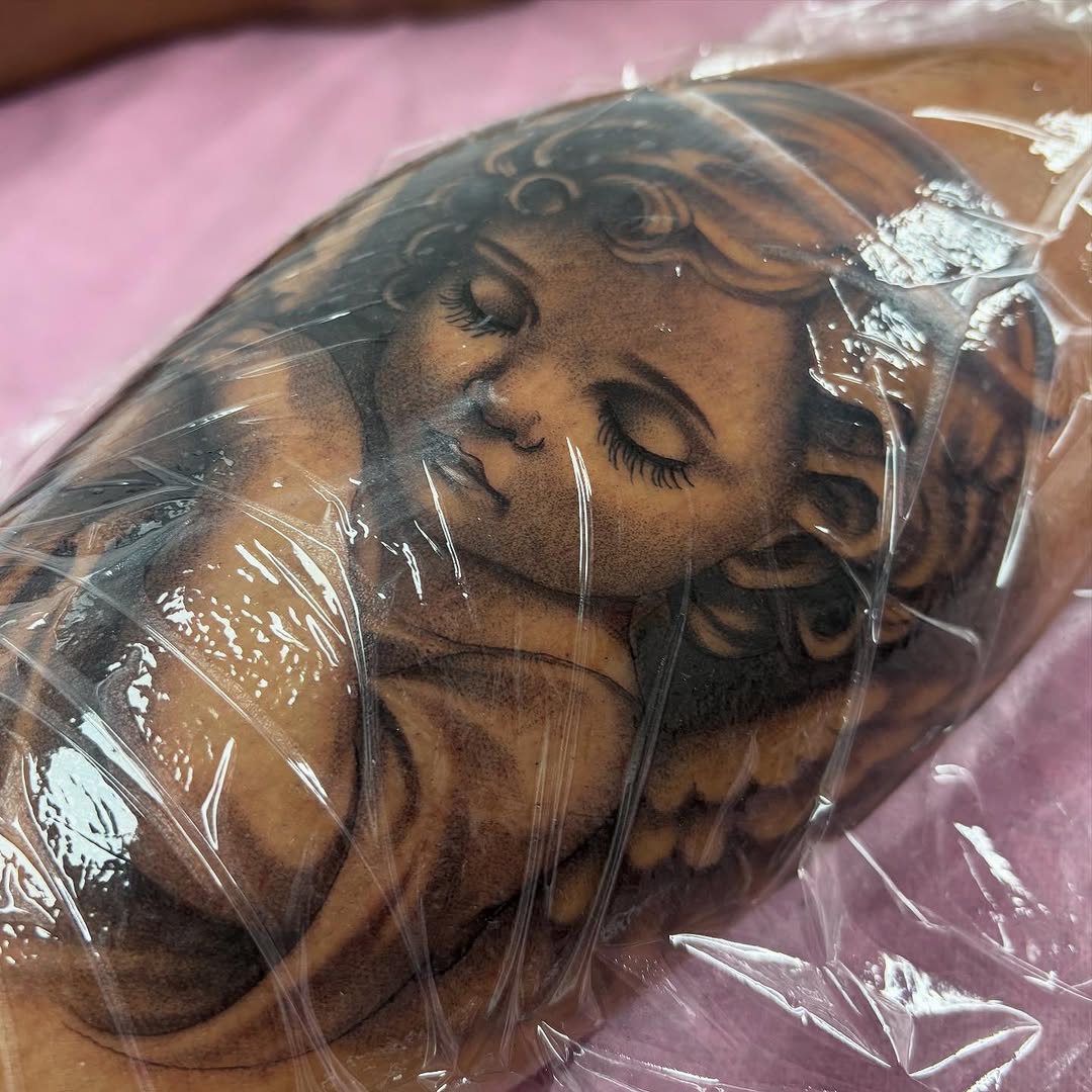 Tattoo by @inkedbysav โ realism, black_and_grey
