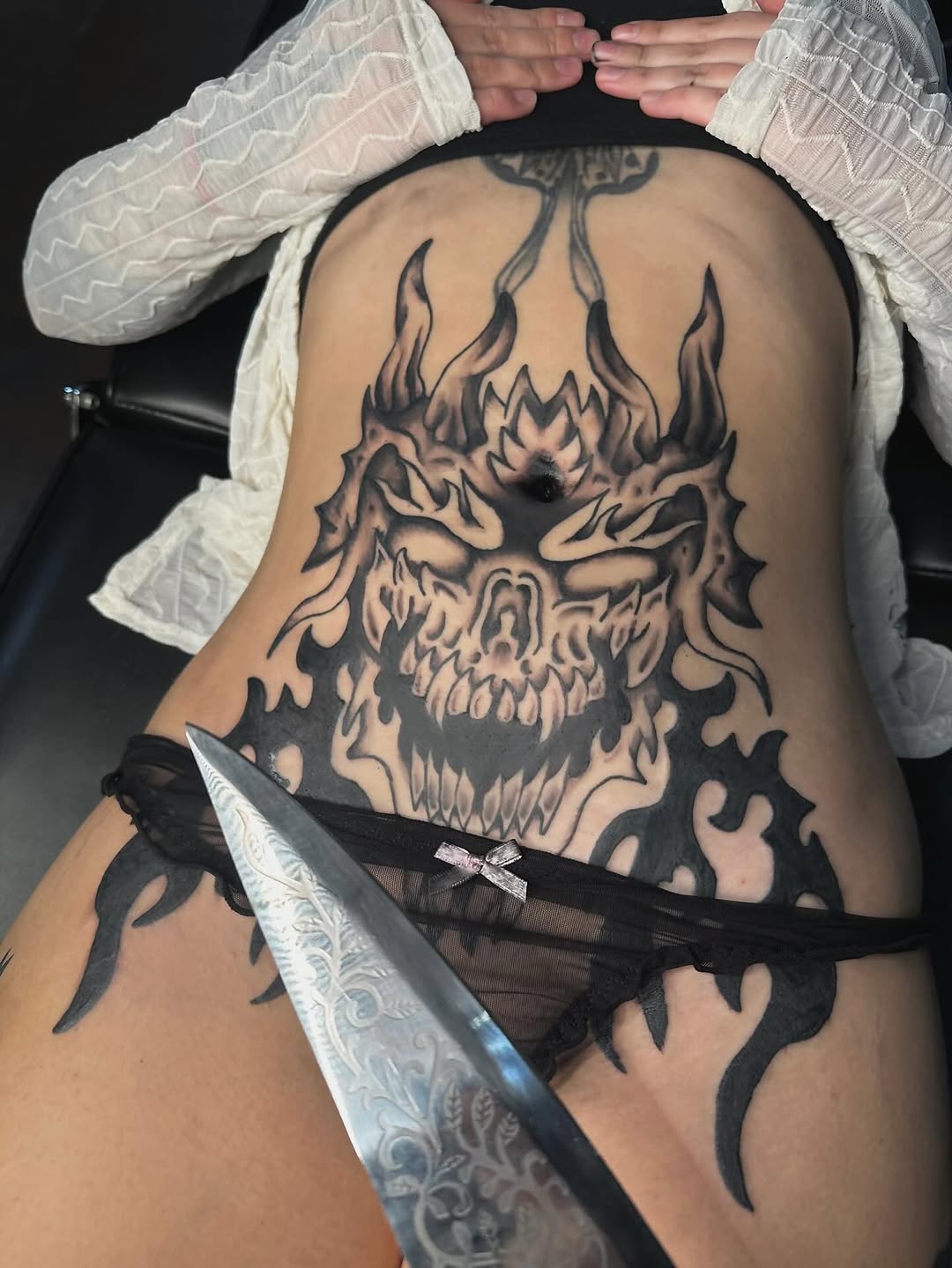 Tattoo by @wizardspire — blackwork, dark_realism