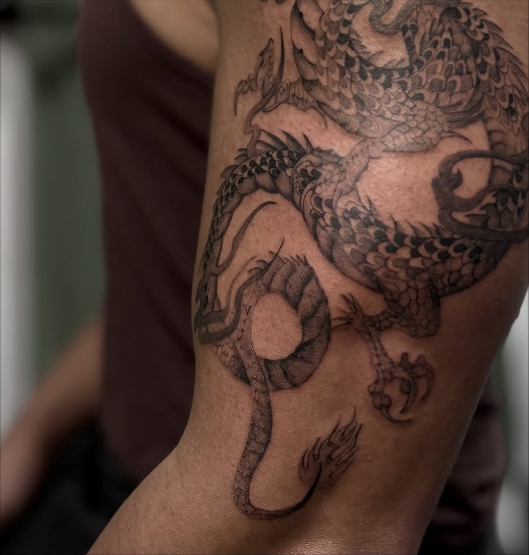 Tattoo by @mugshot.ink — black_and_grey, illustrative