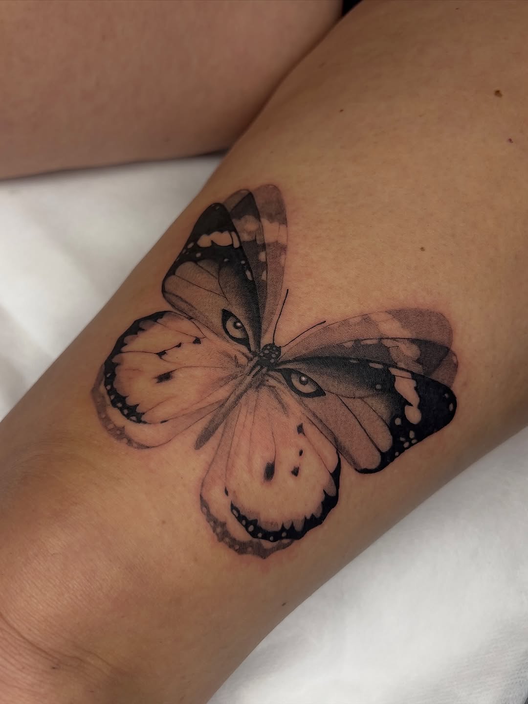 Tattoo by @code_red_ink — realism, black_and_grey