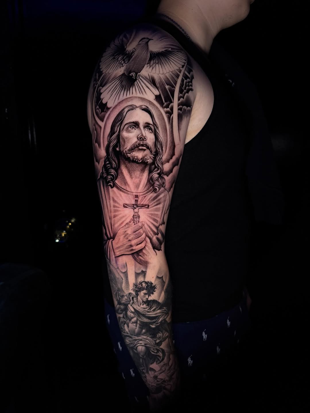 Tattoo by @tatts.x.hustler โ realism, black_and_grey