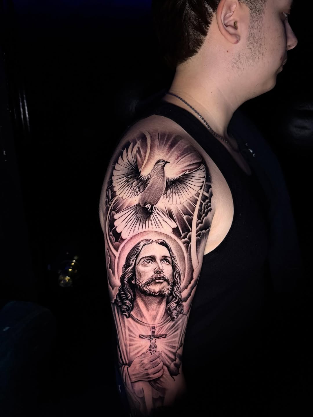 Tattoo by @tatts.x.hustler โ realism, black_and_grey