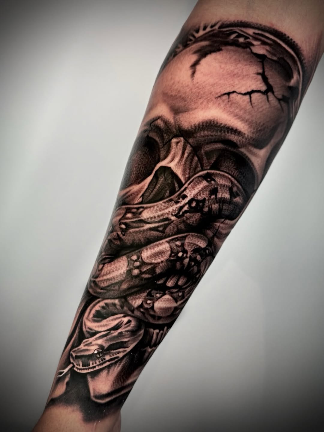Tattoo by @tatts_by_t โ realism, black_and_grey