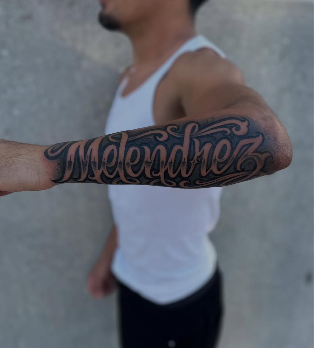 Tattoo by @rubenruiz_tattoos — lettering_script, chicano