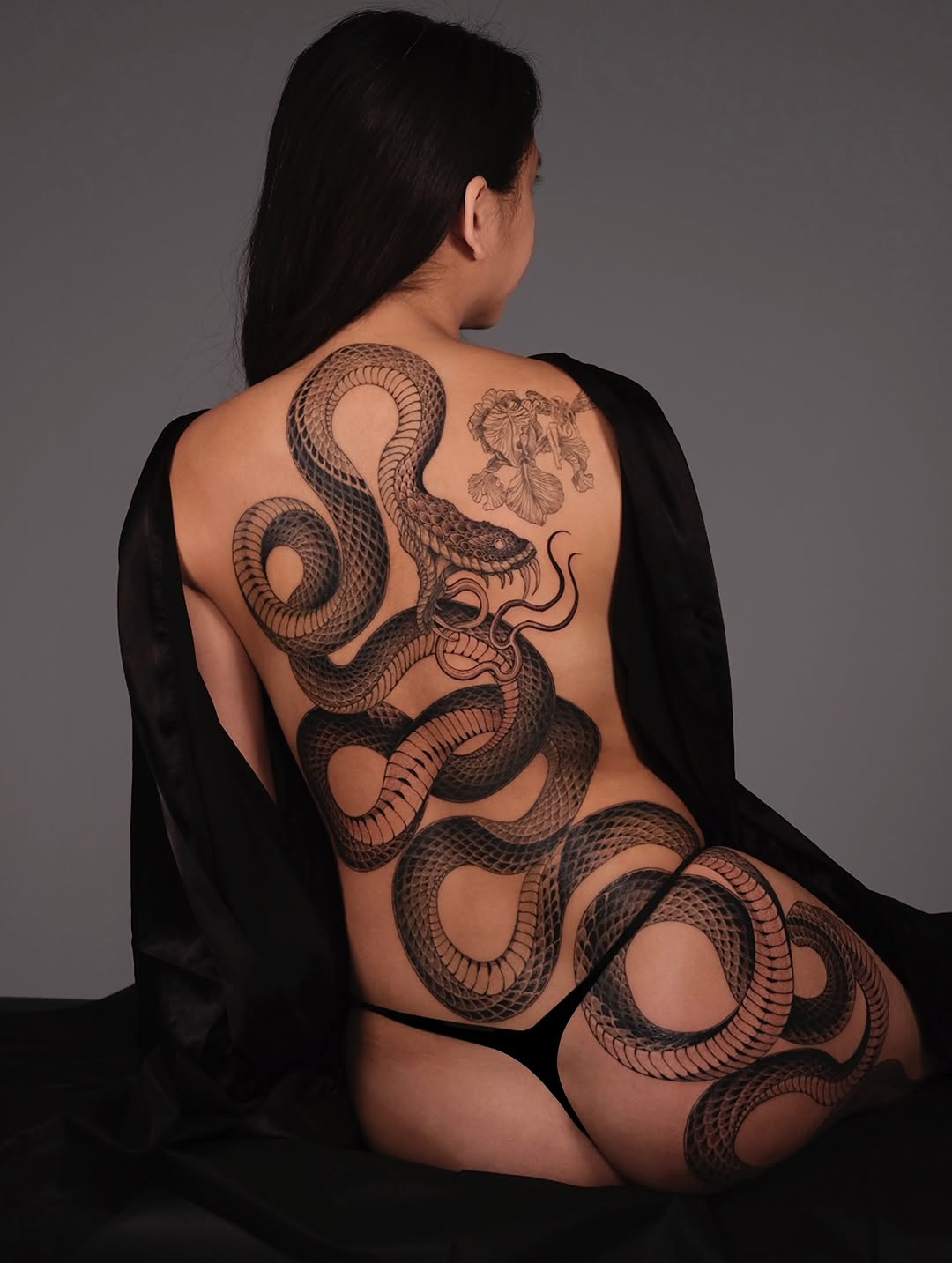 Tattoo by @bayun.tattoos โ realism, black_and_grey