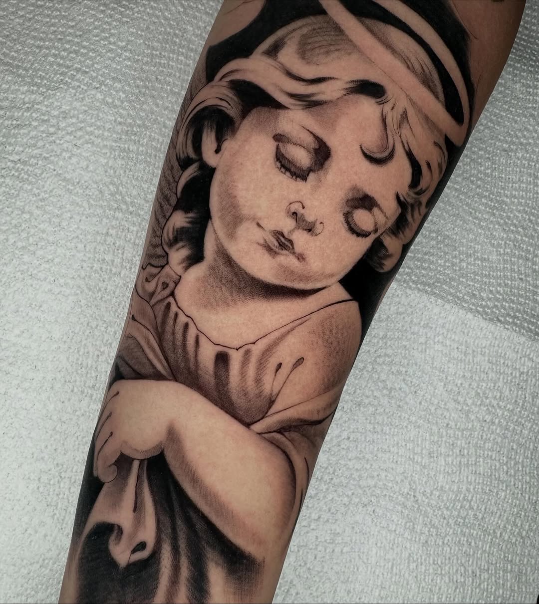 Tattoo by @angeloxlv โ realism, black_and_grey