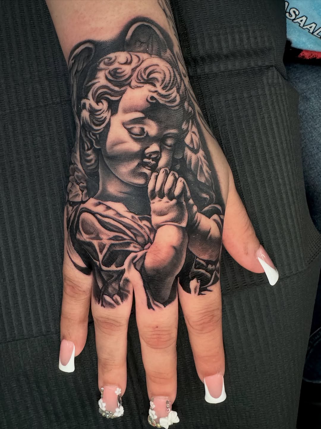 Tattoo by @q_tat2 — realism, black_and_grey