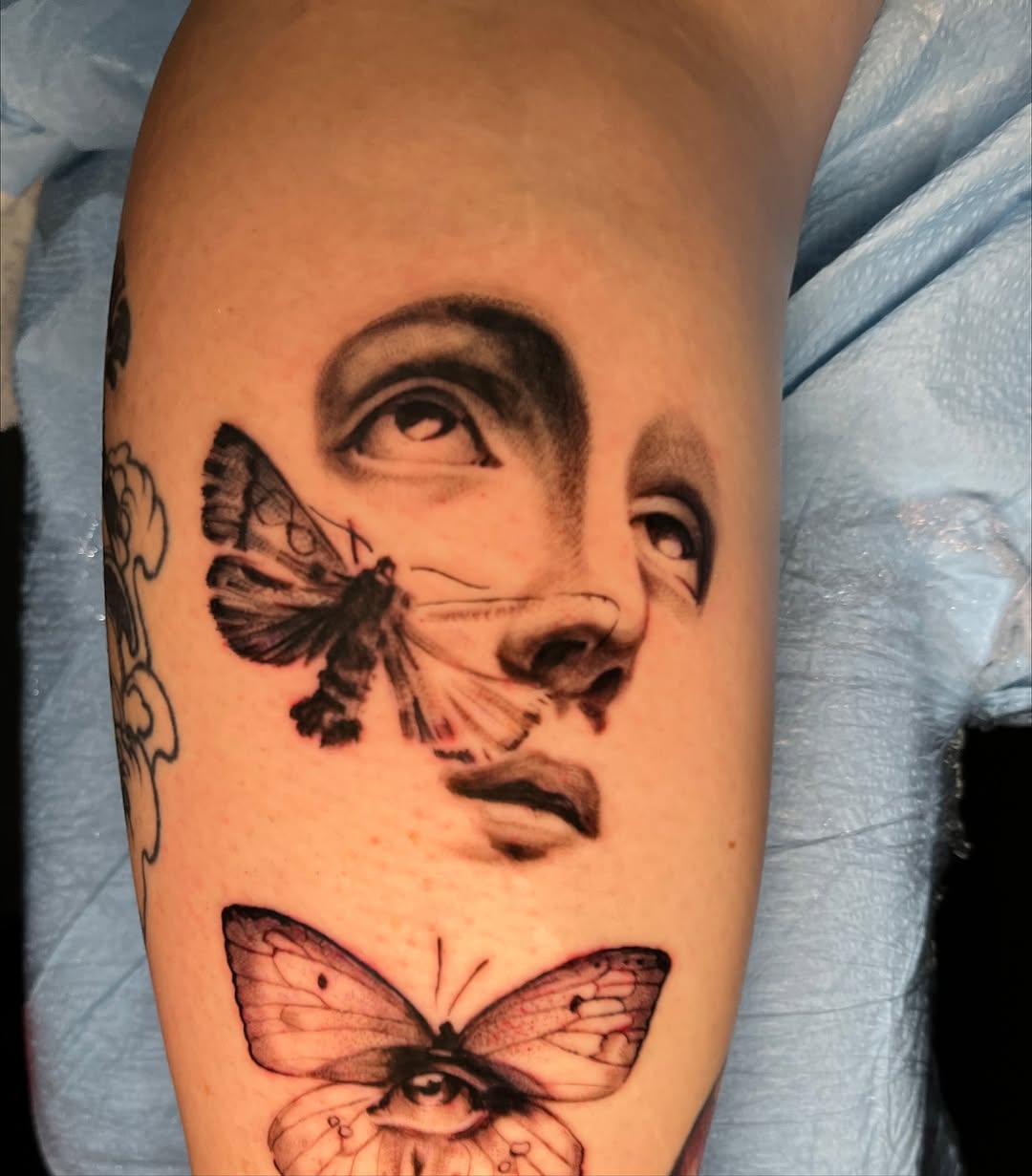 Tattoo by @zurdtauroink — realism, black_and_grey