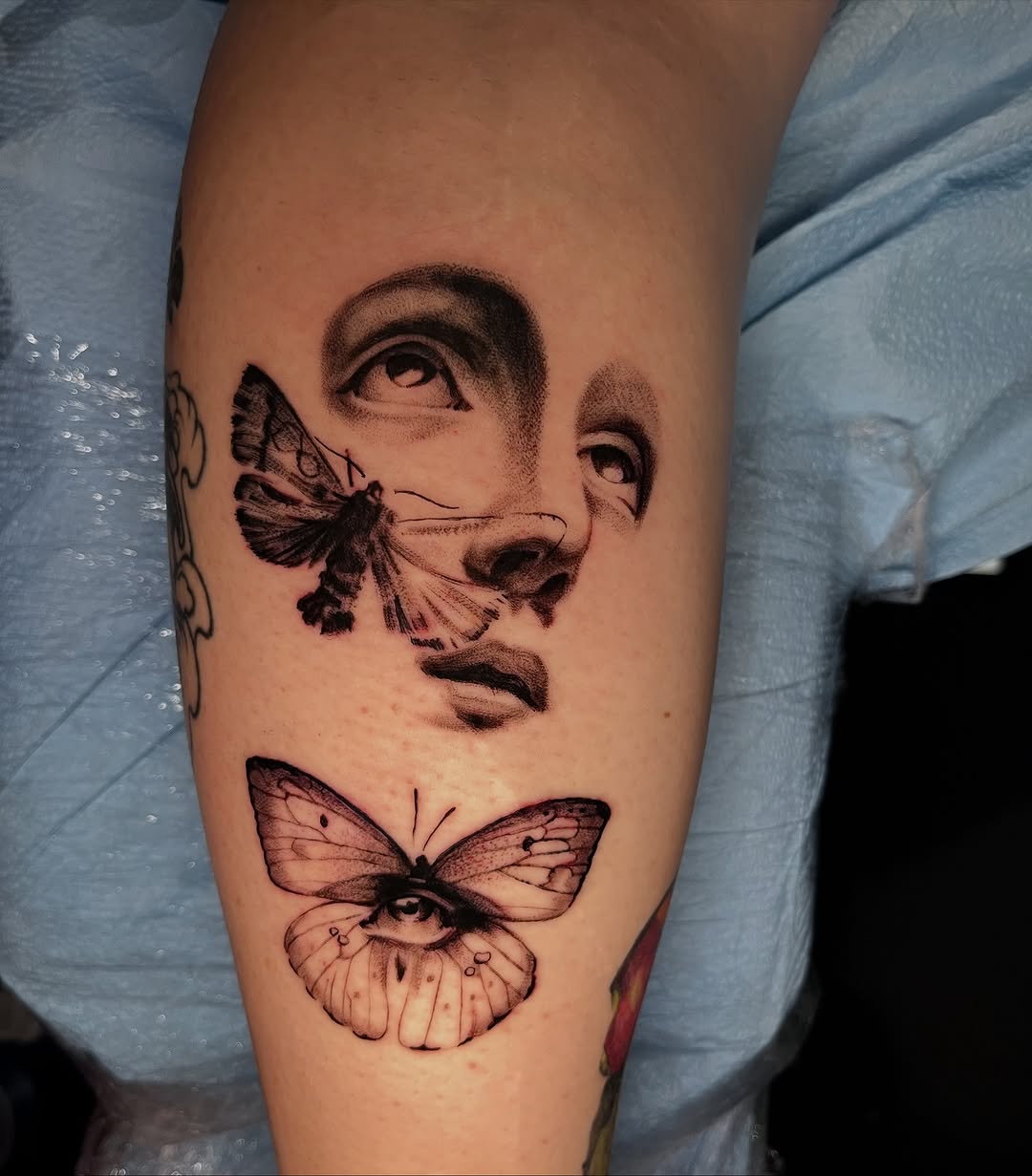 Tattoo by @zurdtauroink — black_and_grey, realism