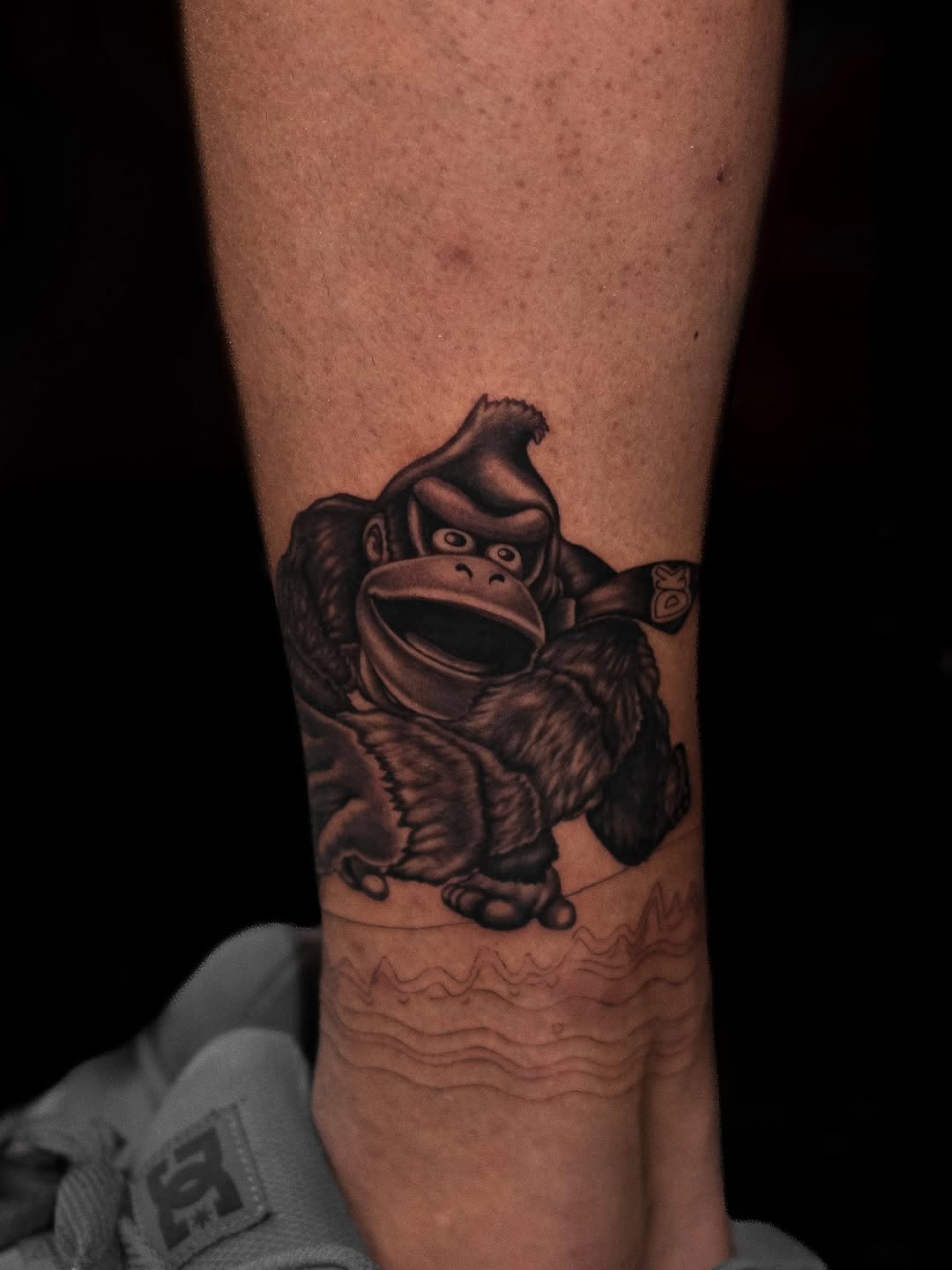 Tattoo by @wenghiskhan_tattoos — realism, black_and_grey