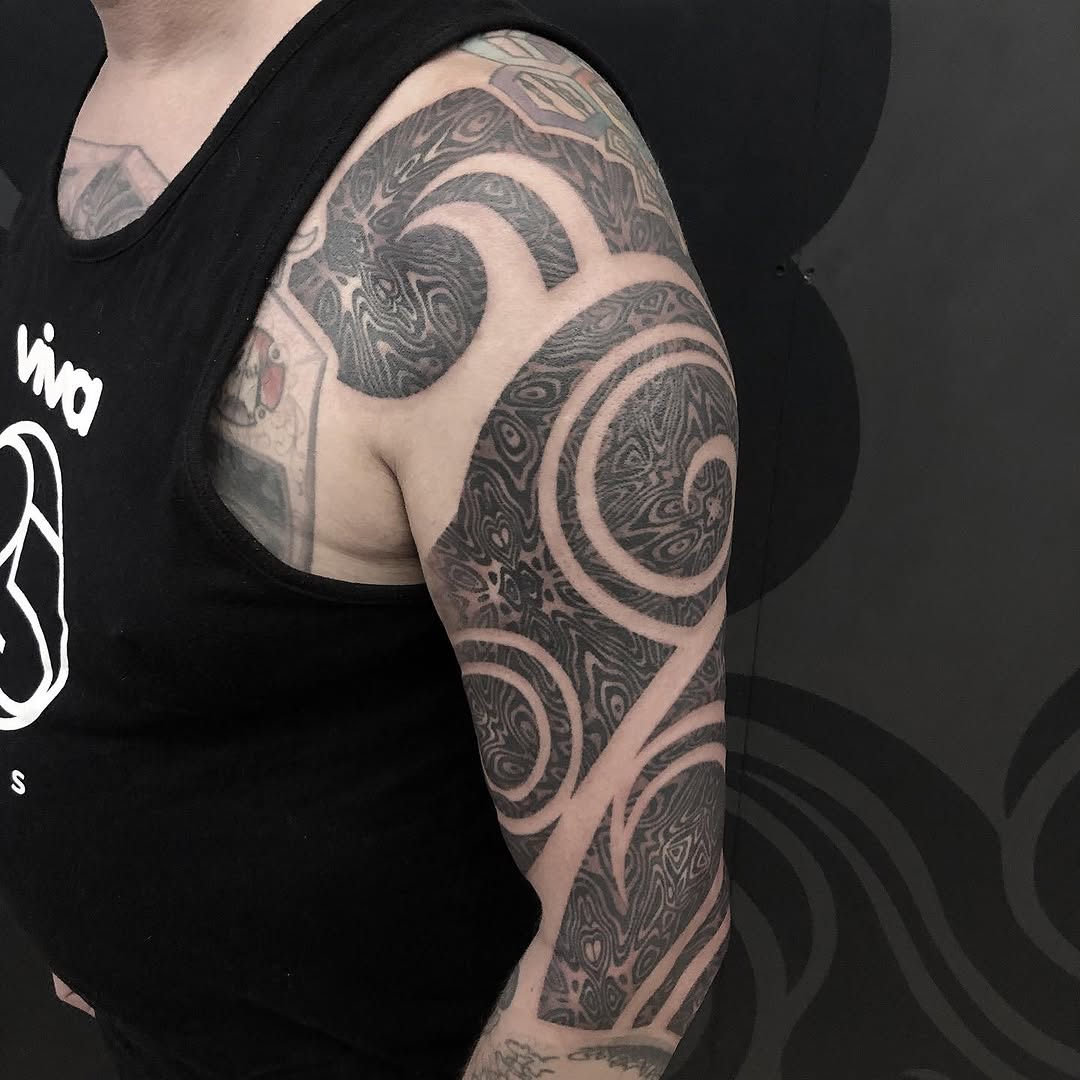 Tattoo by @golden.spiral.lola — blackwork, geometric