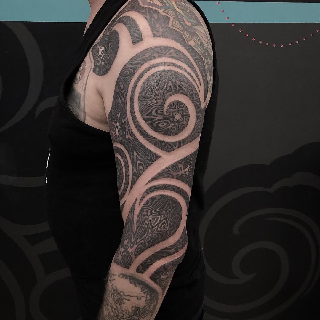 Tattoo by @golden.spiral.lola — blackwork, geometric