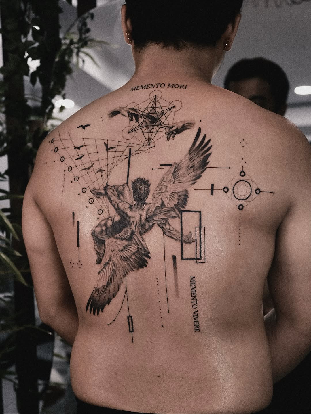 Tattoo by @seraph_gmt — illustrative, blackwork