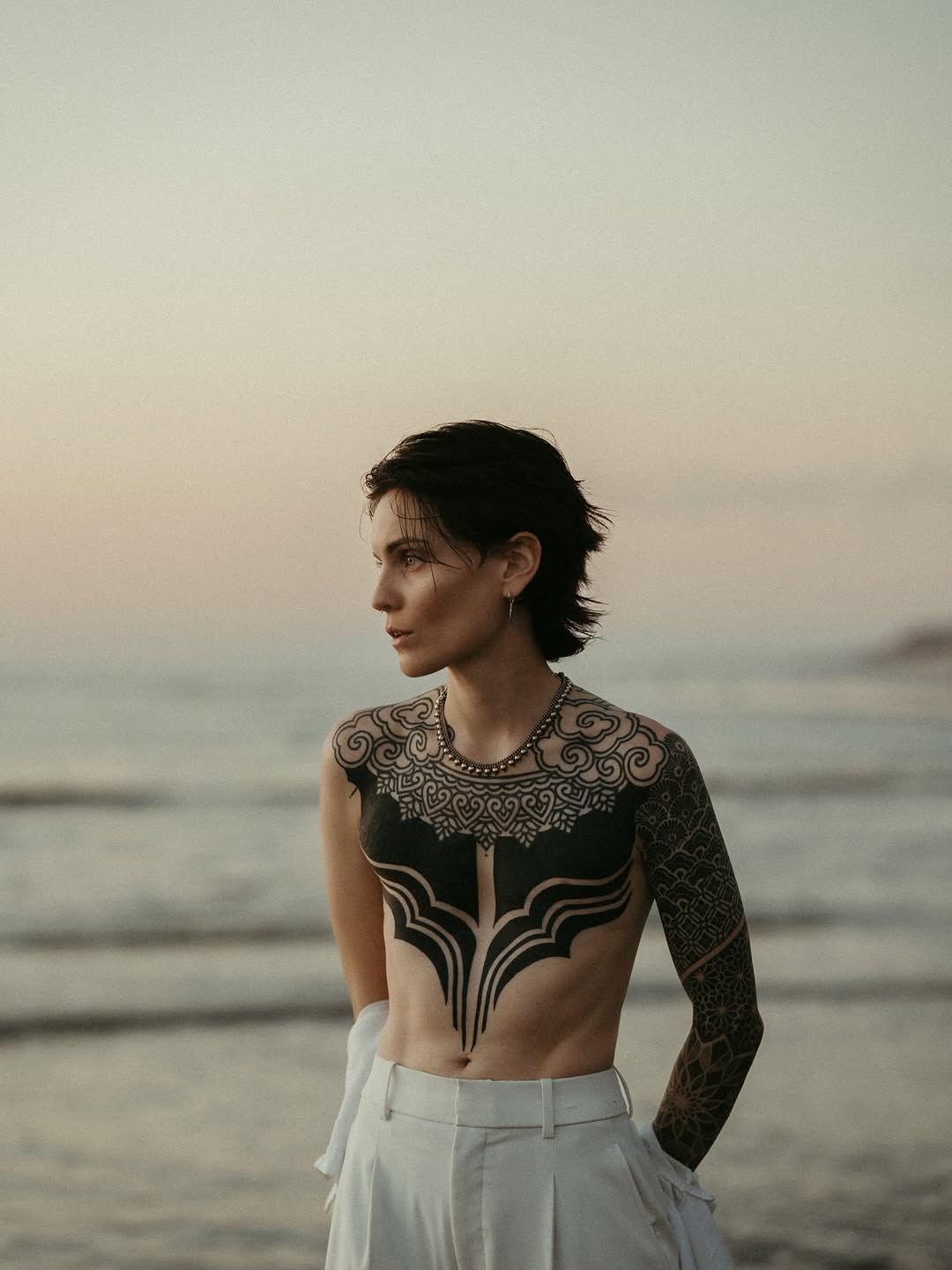 Tattoo by @mystic_tattooing — blackwork, ornamental