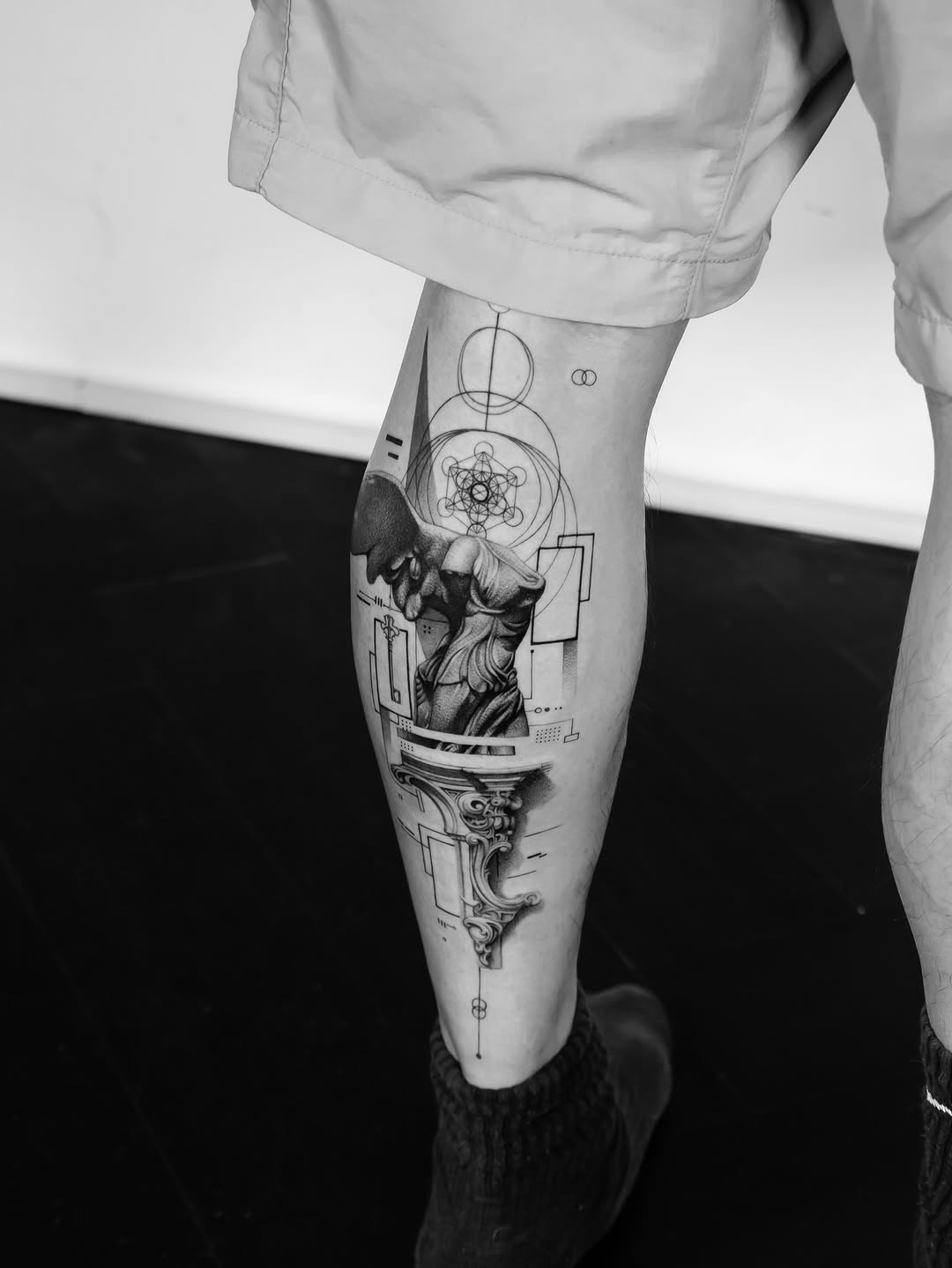 Tattoo by @lai.ink_ — black_and_grey, geometric