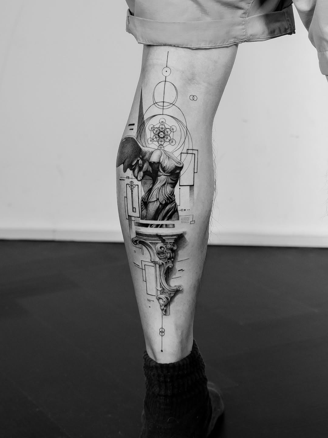 Tattoo by @lai.ink_ — black_and_grey, geometric