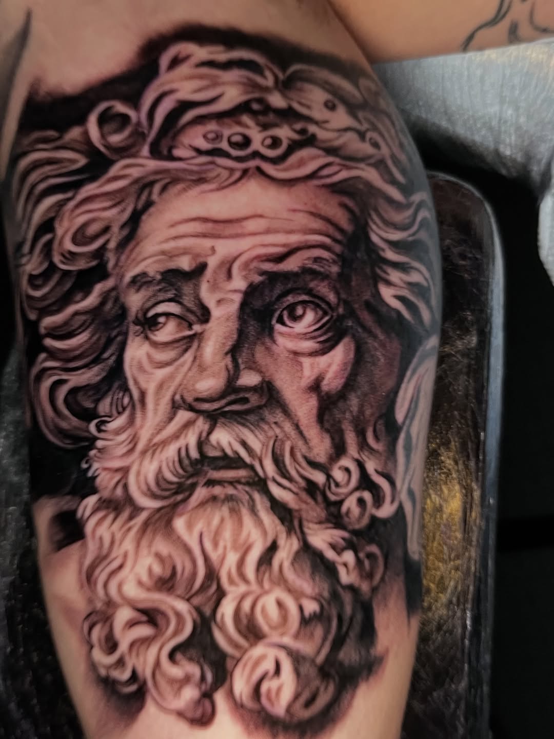 Tattoo by @zurdtauroink — realism, black_and_grey