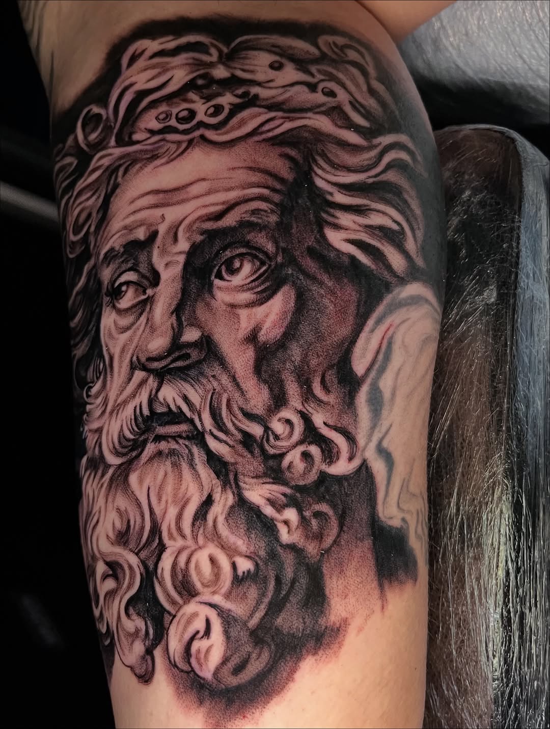 Tattoo by @zurdtauroink — realism, black_and_grey