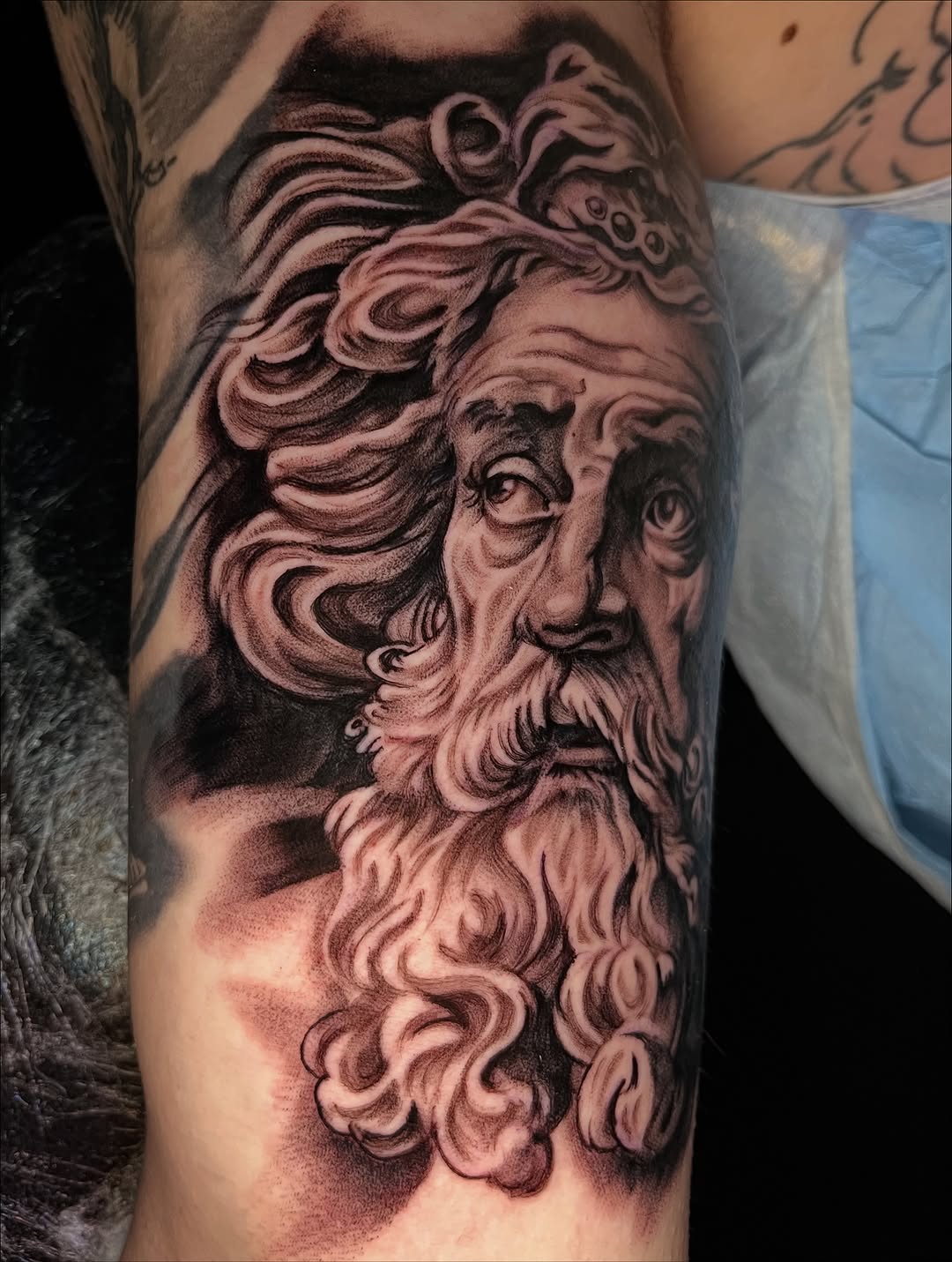 Tattoo by @zurdtauroink — realism, black_and_grey