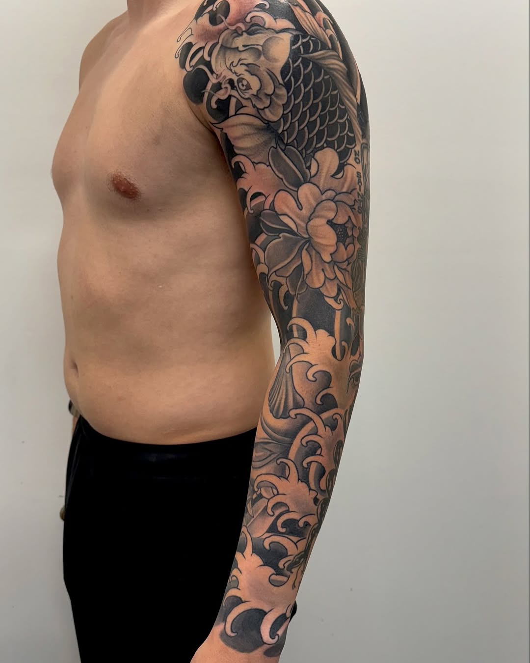 Tattoo by @lucidimprints_tattoo โ japanese_irezumi, black_and_grey
