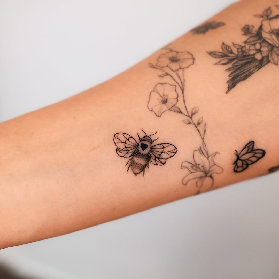 Tattoo by @sky.tattooist17 — fine_line, black_and_grey